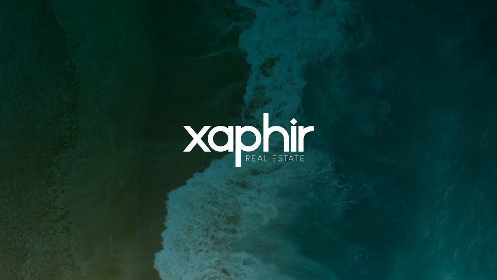 Revista inmobiliaria xaphir olas de mar en verde